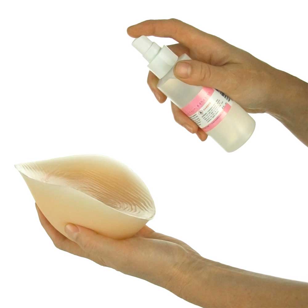 Adhesive breastforms with their protective backing.