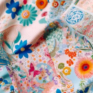 Close-up of floral patterns, pastel colors, and playful prints.
